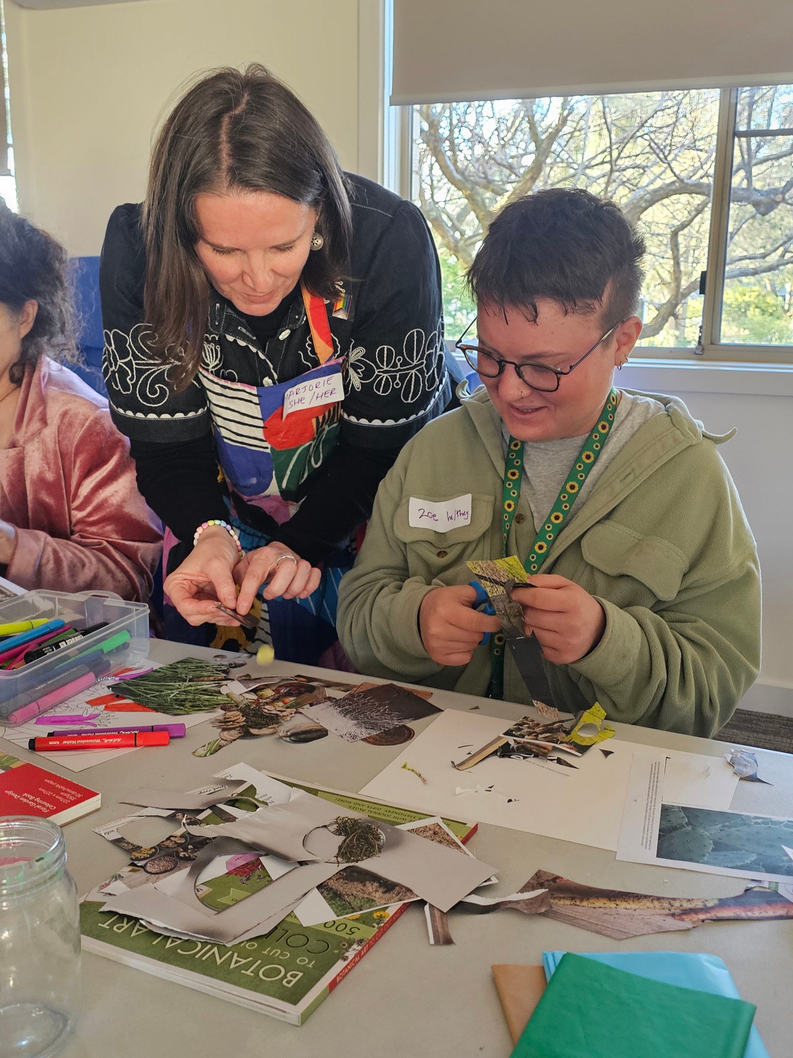 A participant working on a creative collage project